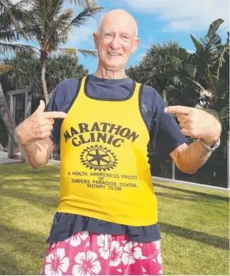  ?? Picture: RICHARD GOSLING ?? John Goldstein, the founder of the Gold Coast Marathon, in the original singlet worn by event athletes.