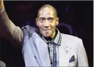  ?? Frank Franklin II / Associated Press ?? Harthorne Wingo waves to the crowd during a ceremony to honor the 1972-73 world champion Knicks at Madison Square Garden in 2013. The former Knick and fan favorite has died. His death in a New York City hospital on Jan. 13 was confirmed by the coroner’s office. No cause was given.