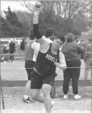  ?? Kelli Loos ?? Matthew Cox of Arcadia-Loup City, shown above, achieves a new PR with a toss of 42-08 for a 5th place finish in the shot put at GICC.