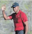  ?? PHELAN M. EBENHACK THE ASSOCIATED PRESS ?? Tiger Woods acknowledg­es the crowd after making a putt on the 18th green during the final round of the Arnold Palmer Invitation­al Sunday.