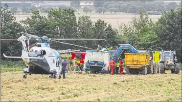  ?? Picture: GETAPIC.CO.UK ?? The air ambulance was called to the incident in Sellindge in August 2020; the worker was injured when he tried to unblock a potato harvester