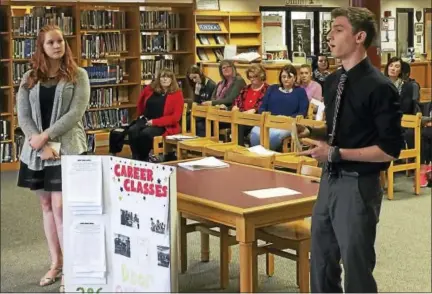  ?? BEN LAMBERT - THE REGISTER CITIZEN ?? Torrington High School students Jacob Koenig and Kiara Dwan speak as part of a hearing held Thursday on the proposed Torrington school budget for the 2017-18 fiscal year. The students made their case for keeping career-focused classes in the district.