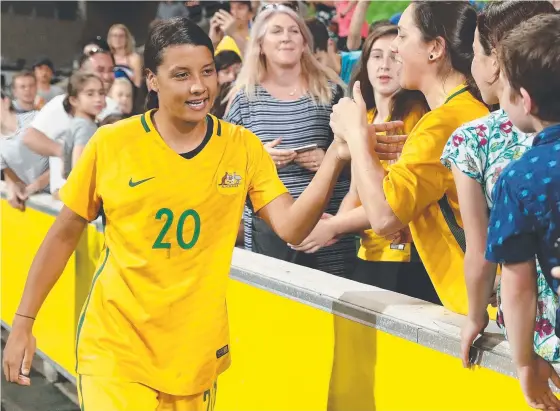  ?? ’ CRAZY YEAR’: Sam Kerr of the Matildas greets fans after Australia’s win over China at AAMI Park earlier this month. ??