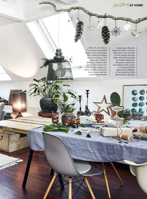  ??  ?? OPEN-PLAN SPACE A long table takes centre stage and has many uses, from crafting and dining to home-working. In the corner, the TV area is defined by a Berber-style rug from Beni Ourain that Lene bought in Morocco, and a modular Carmel sofa from Ilva, on which are cushions from Broste Copenhagen, Brandts Indoor and Ikea. A Chinese chest next to the sofa acts as both storage and side table, while the bowl table from Mater Design sits alongside a rattan stool from Madam Stoltz, which is moved around the apartment as needed. A Flavia lamp from Rue Verte casts a cosy glow