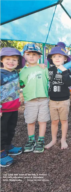  ?? Picture: RICHARD GOSLING ?? Lucy Cook with some of the kids at Amaze’s first early education centre at Hinterland Drive, Mudgeeraba.