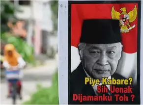  ?? – AFP ?? Losing faith: Disillusio­nment is running high in Indonesia’s democracy while Suharto nostalgia grows.