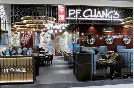  ?? — China Daily/Asia News Network ?? A big hit: Customers dining at P.F. Chang’s in Shanghai.