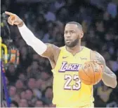  ?? RINGO H.W. CHIU/AP ?? The Lakers’ LeBron James played on three teams in the 2010s and won titles with the Cavaliers and Heat.