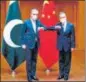  ??  ?? Pakistan FM Shah Mahmood Qureshi (left) with his Chinese counterpar­t Wang Yi.