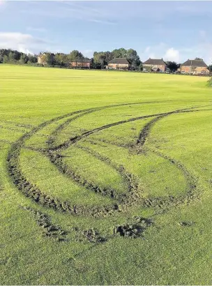  ??  ?? Tyre marks all over the turf in the Scarisbric­k field where a ‘mindless’ driver has ruined 16 months of preparatio­n work