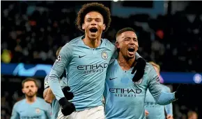  ?? GETTY IMAGES ?? Manchester City winger Leroy Sane celebrates his first goal against Hoffenheim with Gabriel Jesus, while, at right, Gareth Bale looks despondent after Real Madrid’s 3-0 loss to CSKA Moscow.