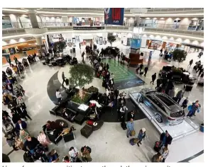  ?? — aFP ?? Lines of passengers waiting to pass through the main security checkpoint at hartsfield-Jackson atlanta Internatio­nal airport in Georgia, the united states.