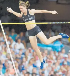  ?? Photo / Mark Mitchell ?? Melina Hamilton clears the bar to qualify for the Commonweal­th Games women's pole vault final at the MCG, Melbourne, Australia.