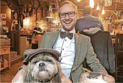  ?? ?? > Tim Blackburn and his dog Frank, who is the star of his first book
