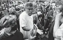  ?? Gerry Broome / Associated Press ?? People protest Wednesday after a Pasquotank County deputy shot and killed a Black man while serving a search warrant.