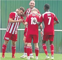  ?? ?? Formartine United’s Scott Lisle (left) celebrates scoring the winner against his former team, Brora Rangers