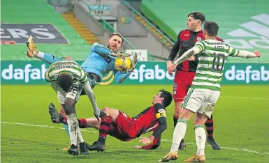  ??  ?? St Mirren’s Jak Alnwick makes a vital save