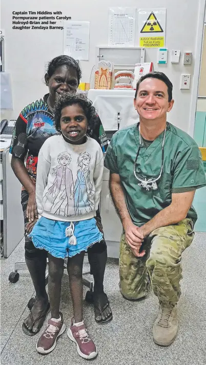  ??  ?? Captain Tim Hiddins with Pormpuraaw patients Carolyn Holroyd-brian and her daughter Zendaya Barney.