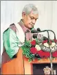  ?? ANI ?? Manoj Sinha takes oath in Srinagar on Friday.