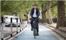  ?? Photograph: Stefan Rousseau/PA ?? Sadiq Khan, mayor of London, on a new Streetspac­e cycle lane in London, July 2020.