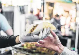  ?? PHOTOS: GETTY IMAGES ?? Tasty treats . . . The internatio­nal fare on offer at downtown LA’s Grand Central Market includes everything from street tacos to fresh produce.