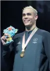  ?? PHOTO: GETTY IMAGES ?? New Zealand heavyweigh­t boxer David Nyika is all smiles after winning the gold medal at last month’s Commonweal­th Games on the Gold Coast.