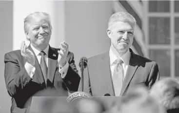  ?? Getty Images file ?? President Donald Trump has filled many judicial seats in just 10 months, including the confirmati­on of Neil Gorsuch to the U.S. Supreme Court. His picks have been predominan­tly white, male and conservati­ve.