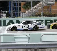  ?? WILFREDO LEE — THE ASSOCIATED PRESS ?? Chase Briscoe (98) crosses the finish line ahead of Brandon Jones (19) to win a NASCAR Xfinity Series auto race Sunday, June 14, 2020, in Homestead, Fla.