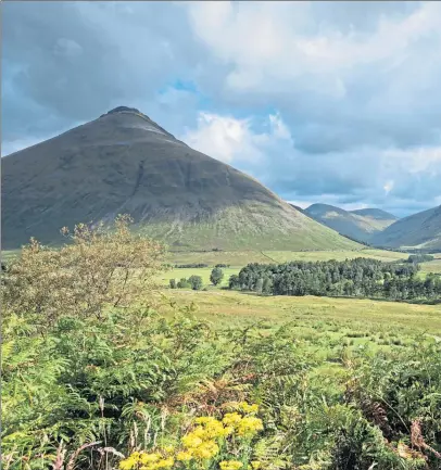  ??  ?? Looking north toward Beinn Dorian, on left, and, below, Strathfill­an Wigwams on the outskirts of Tyndrum