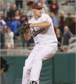  ?? (Photo by Kelly Price, MSU athletic media relations, for Starkville Daily News) ?? Riley Self prepares to deliver a pitch for the Bulldogs during a game earlier this season.