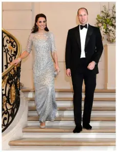 ??  ?? ABOVE: Kate and Prince William attending a British Embassy dinner in Paris during their official visit to France in March.