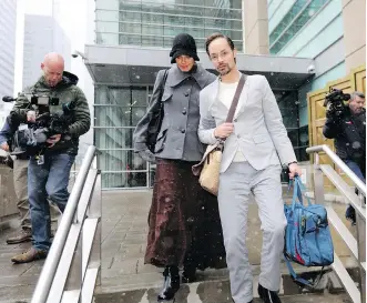  ?? DARREN MAKOWICHUK ?? Jennifer and Jeromie Clark, shown leaving Calgary Courts on Monday, are charged with criminal negligence causing the death of their 14-month-old son, John Clark.