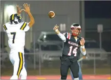  ?? Special to The TIMES ?? Blackhawk sophomore Jakota Sainsbury, No. 14, threw a pass that Kevontae Andrews of Trumann attempted to block Friday night in the new battlegrou­nd, Blackhawk Stadium.