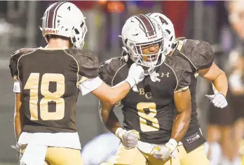  ?? APRIL GAMIZ/THE MORNING CALL ?? Tavion Banks (8) and Bethlehem Catholic had plenty to celebrate in their 44-7 thumping of Parkland on Saturday night.