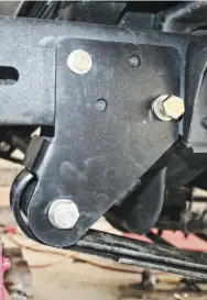  ??  ?? A Reverse Shackle kit from Sky’s Off-road was the answer to our prayers when it came to upgrading the front suspension. By moving the shackle on the front suspension the rear mount of the leaf spring, you get more efficient suspension travel. This kit also replaced the factory leaf springs with newer longer springs from a 99-03 Super Duty truck. You can’t even compare ride quality from before and after. The RSK suspension is hands down the best money and time you could spend on an OBS Ford.