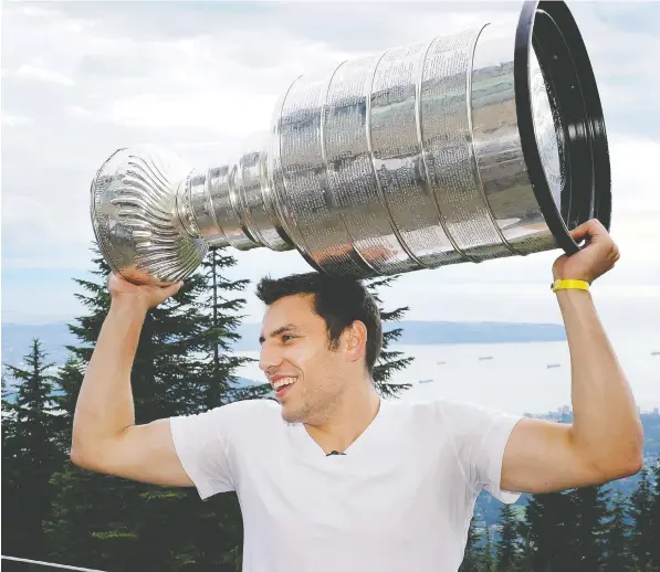  ?? — MARK VAN MANEN ?? The Flames’ Milan Lucic won a Stanley Cup with the Boston Bruins in 2011 — something Canucks fans certainly remember — and is excited about the prospect of playing for another one under the NHL’s planned 24-team tournament set to begin later this summer.