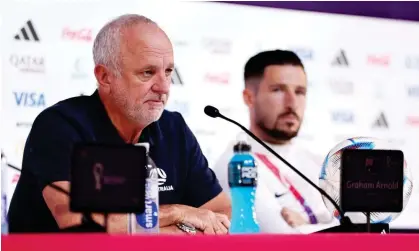  ?? Photograph: Christophe­r Lee/Getty Images ?? ‘There’s one sporting team that unites a nation, and it’s the Socceroos’: Graham Arnold at possibly his final pre-match press conference as Australia coach.