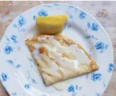  ??  ?? Ooh, la la: Homemade crepes with butter, sugar, lemon and a drizzle of condensed milk