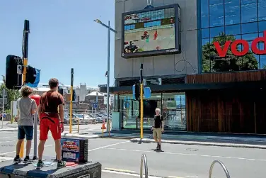  ?? PHOTO: STACY SQUIRES/FAIRFAX NZ ?? The Super Street Arcade game was installed on Tuam St opposite the Vodafone building in central Christchur­ch on Thursday.