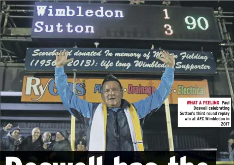 ??  ?? WHAT A FEELING Paul Doswell celebratin­g Sutton’s third round replay win at AFC Wimbledon in 2017
