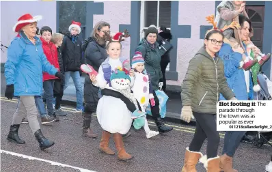  ?? 011218call­anderlight_2 ?? Hot footing it parade through the town was as popular as ever The