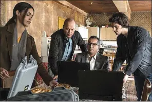  ?? American Assassin. ?? Annika ( Shiva Negar), Stan ( Michael Keaton), Turkish operative ( Nej Adamson) and Mitch ( Dylan O’Brien) plot some dark stuff in