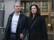  ?? (AP/John Minchillo) ?? Charles McGonigal (left), former special agent in charge of the FBI’s counterint­elligence division in New York, leaves court Monday in New York.