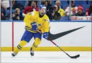  ?? MARK BLINCH — THE CANADIAN PRESS VIA AP, FILE ?? In this file photo, Sweden’s Rasmus Dahlin skates during the second period of an IIHF world junior hockey championsh­ips game against Russia in Buffalo, N.Y. First, the Buffalo Bills made a pair of splashes in the first round of the NFL draft. Two days...