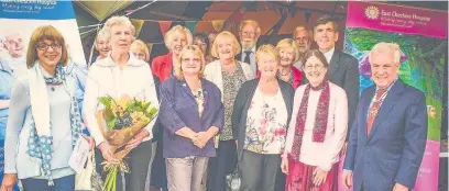  ??  ?? ●● East Cheshire Hospice volunteers receiving their five, 10, 15 and 25 year awards from hospice chairman, Rob Barrow and Macclesfie­ld MP David Rutley (picture sent in by Lynne McCadden)