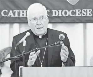  ?? FILE PHOTO BY FRANK FRANKLIN II/ AP ?? Bishop Richard Malone of Buffalo, speaking during a news conference last year in Cheektowag­a, N. Y., is leaving his post.