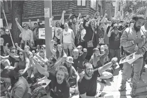  ?? JIM WILSON/NEW YORK TIMES FILE PHOTO ?? Counterpro­testers show their opposition to far-right groups holding a rally Saturday in San Francisco. Activists increasing­ly are using social media to try to publicly identify and shame their opponents, which raises ethical concerns about mistakes.