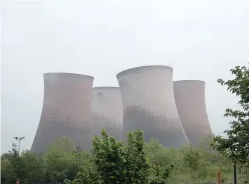  ??  ?? Richard Pursehouse’s pictures of the demolition of the cooling towers at the former Rugeley Power Station