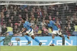  ?? (PA Wire/DPA) ?? Brazil’s Endrick (L) celebrates scoring the opening goal of the game during the internatio­nal friendly soccer match against England at Wembley Stadium on Saturday.