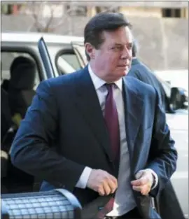  ?? SUSAN WALSH — THE ASSOCIATED PRESS FILE ?? Former Trump campaign chairman Paul Manafort arrives at federal court in Washington. In a dramatic escalation of pressure and stakes, special counsel Robert Mueller filed additional criminal charges against Manafort and his business associate, Rick...